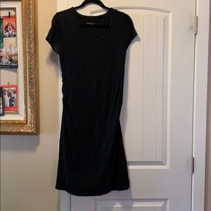 Simple black maternity dress.